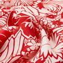 A close up of a red floral pattern of a silk scarf.